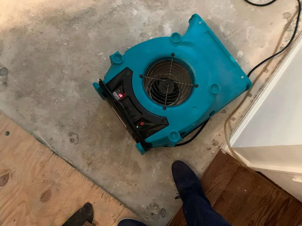 Air mover drying subfloor during Leak Detection & Repair in Makaha